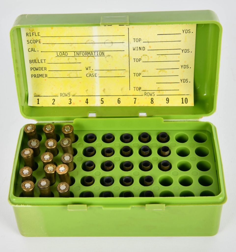 Lot 106: 15 live rds and 23 casings 22 Hornet and container