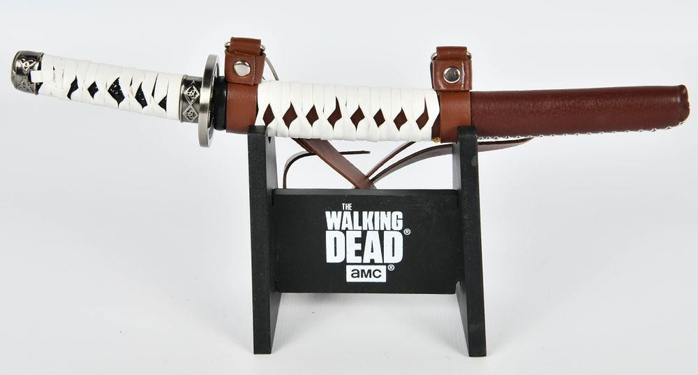 Lot 345: Mini Walking Dead Michonne Sword Display
