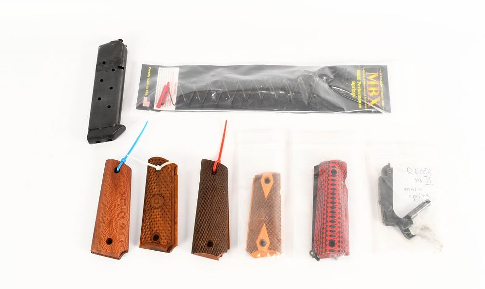 Lot 352: (5) various Grips, MBX spring, RUber spring,mag