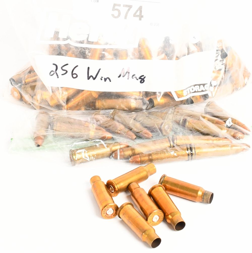Lot 574: 15 rds 256 win mag and 69 ct of brass