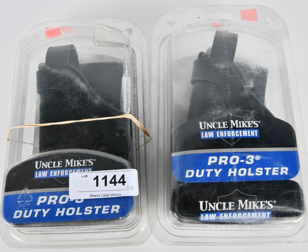 Lot 1144: (2) nip Uncle Mikes' Law Enforcement pro-3 Holstes