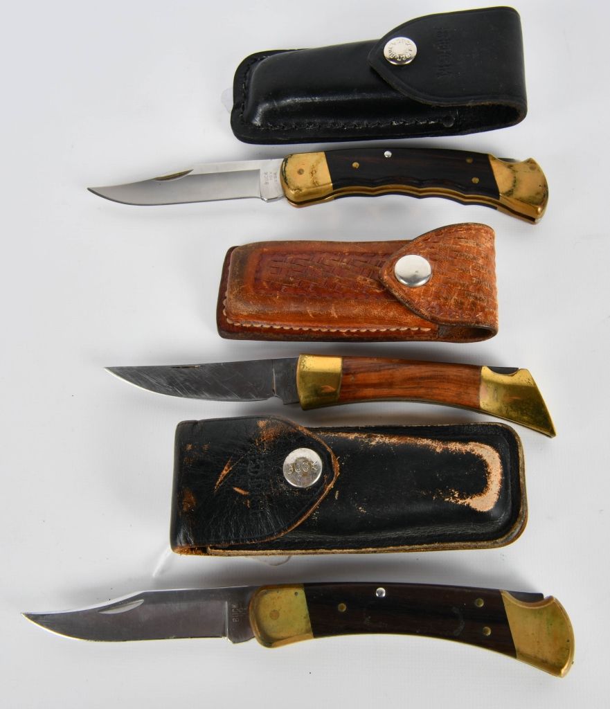 Lot 1387: (3)Folding Pocket knives in leather sheath