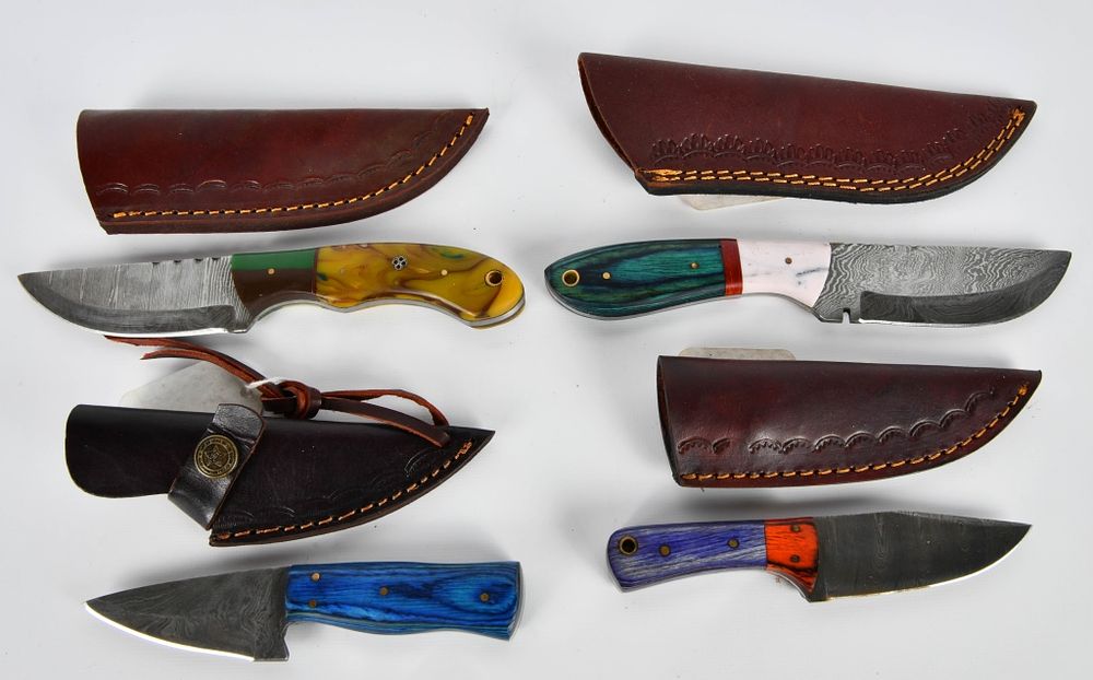 Lot 1567: (4) Various Damascus Fixed Blade Knives
