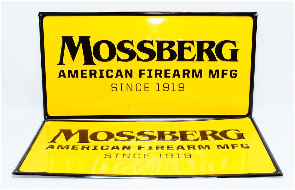 Lot 86: A Pair of Mossberg Advertising Signs with Four Boxes of Vintage Shotgun Shells