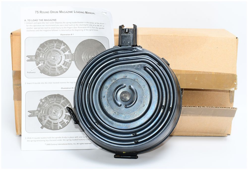 Lot 128: A Romanian AK-47 75-Round Drum Magazine