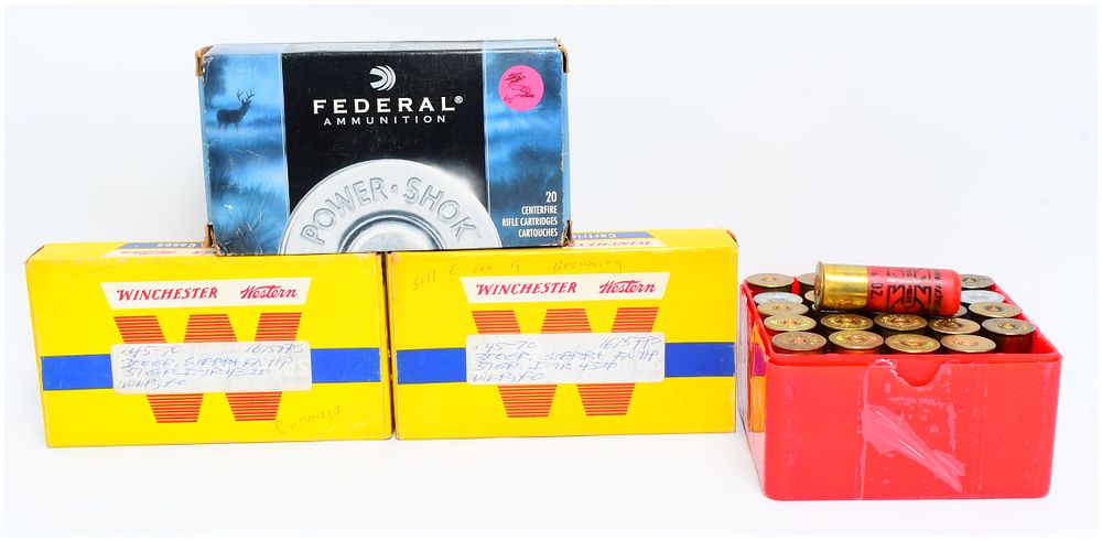 Lot 151: A Collection of 63 Rounds of Ammunition, 20 Empty .45-70 Brass Casings, and Three Vintage Ammunition Boxes