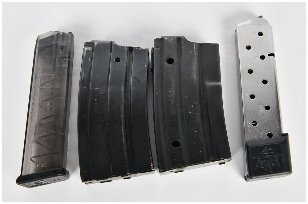 Lot 428: A Group of Four Assorted Firearm Magazines, including Glock 19, AR-15/M16, and Chip McCormick .45 ACP