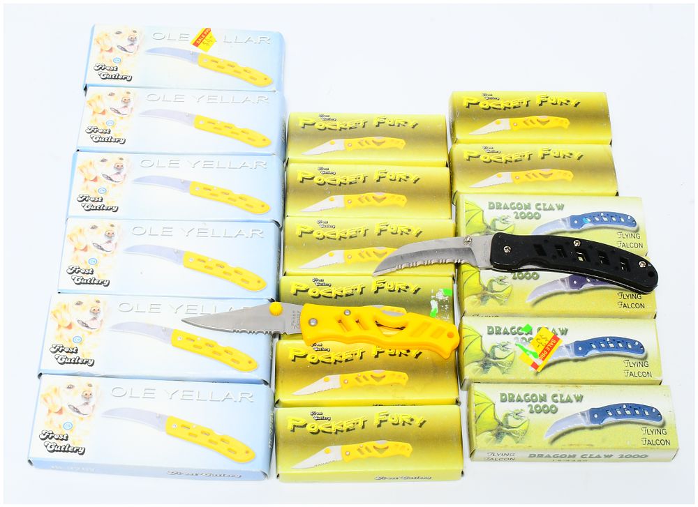 Lot 509: A Collection of 16 Frost Cutlery 'Ole Yellar', 'Pocket Fury', and 'Dragon Claw 2000' Folding Knives, New-in-Box and Loose