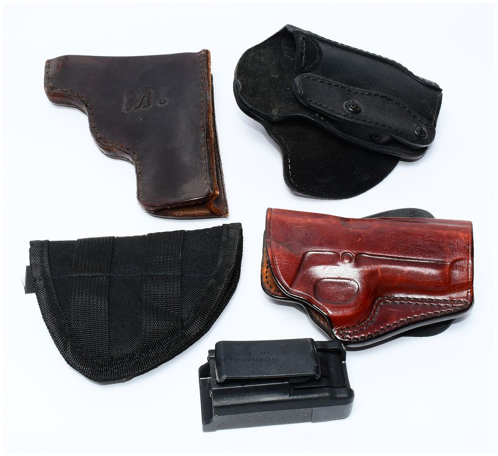 Lot 518: Five Modern Firearm Accessories, including Holsters and a Magazine Pouch