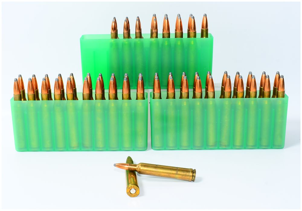 Lot 1057: 57 Rounds Total Rifle Ammunition, 8 Rounds .240 WBY MAG & 49 Rounds .30-06 SPRG, with MTM Storage Boxes