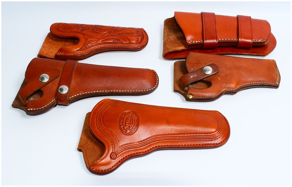 Lot 1172: A Group of Five Western-Style Leather Gun Holsters, including one by Hilda, Arizona