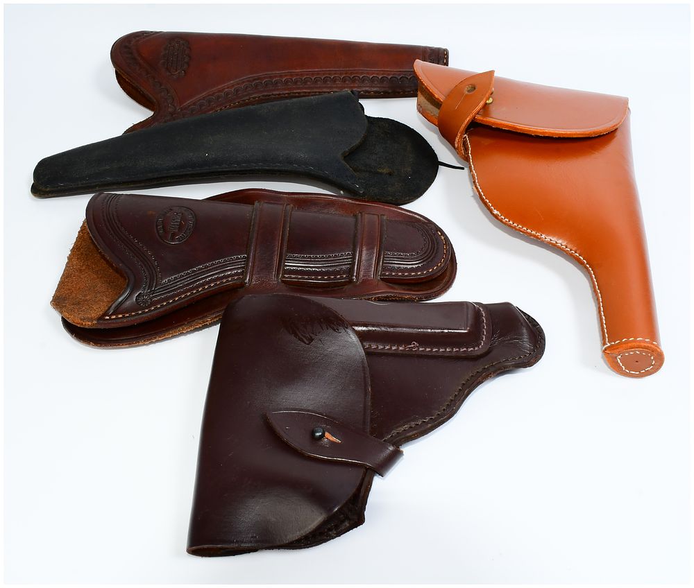 Lot 1262: Five Assorted Leather Gun Holsters, Including a US M1917-Style Example and a Bianchi 'Pat Pend' Holster