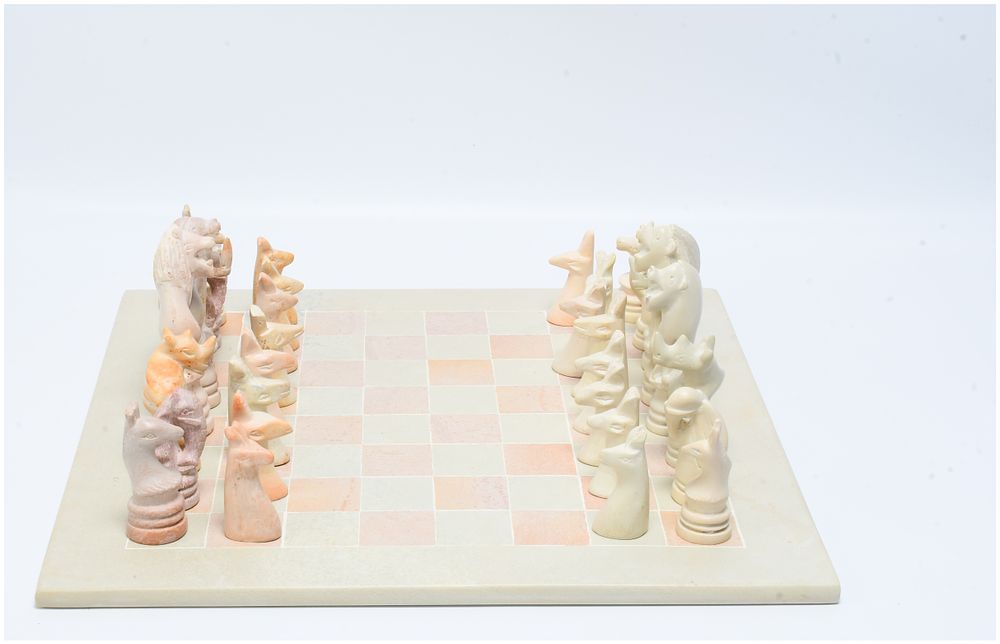 Lot 1472: African Soapstone Animal-Themed Chess Set