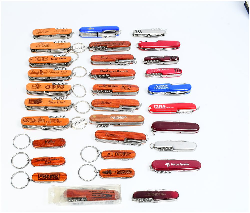 Lot 1508: A Collection of Approximately 40 'Swiss Army Style' Multi-Tool Pocket Knives, Likely TSA Confiscated