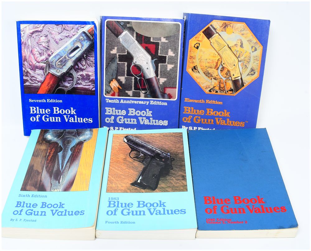 Lot 1526: A Collection of Six 'Blue Book of Gun Values' Reference Books by S. P. Fjestad