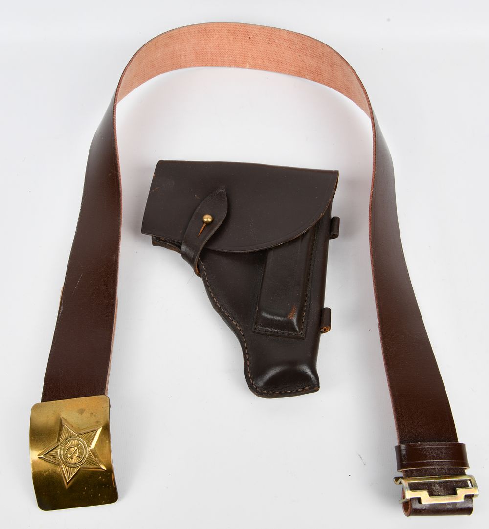 Lot 1226: A Soviet-Era Makarov Pistol Leather Holster and Uniform Belt