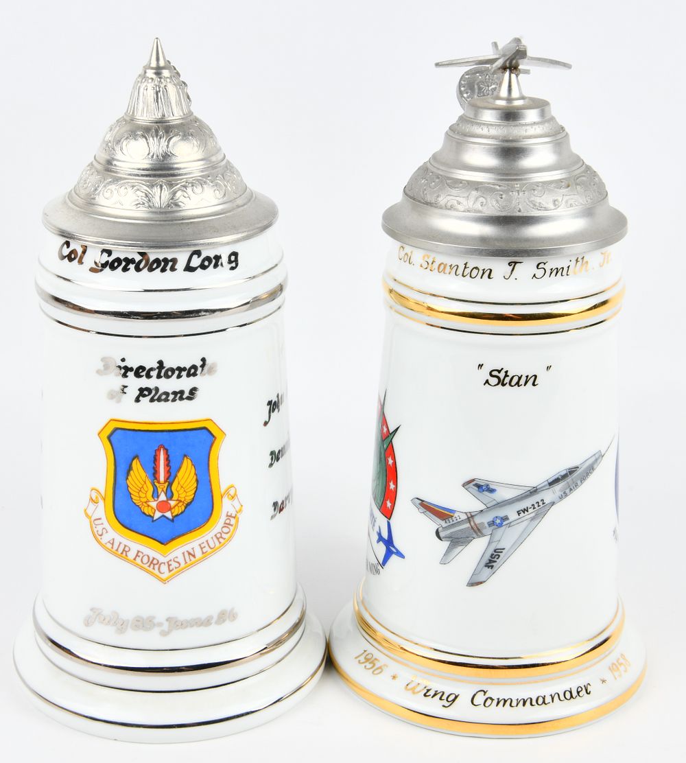 Lot 1373: A Pair of German Porcelain US Air Force Commemorative Lithophane Steins, retailed by Baur's Camera & Souvenir Shop