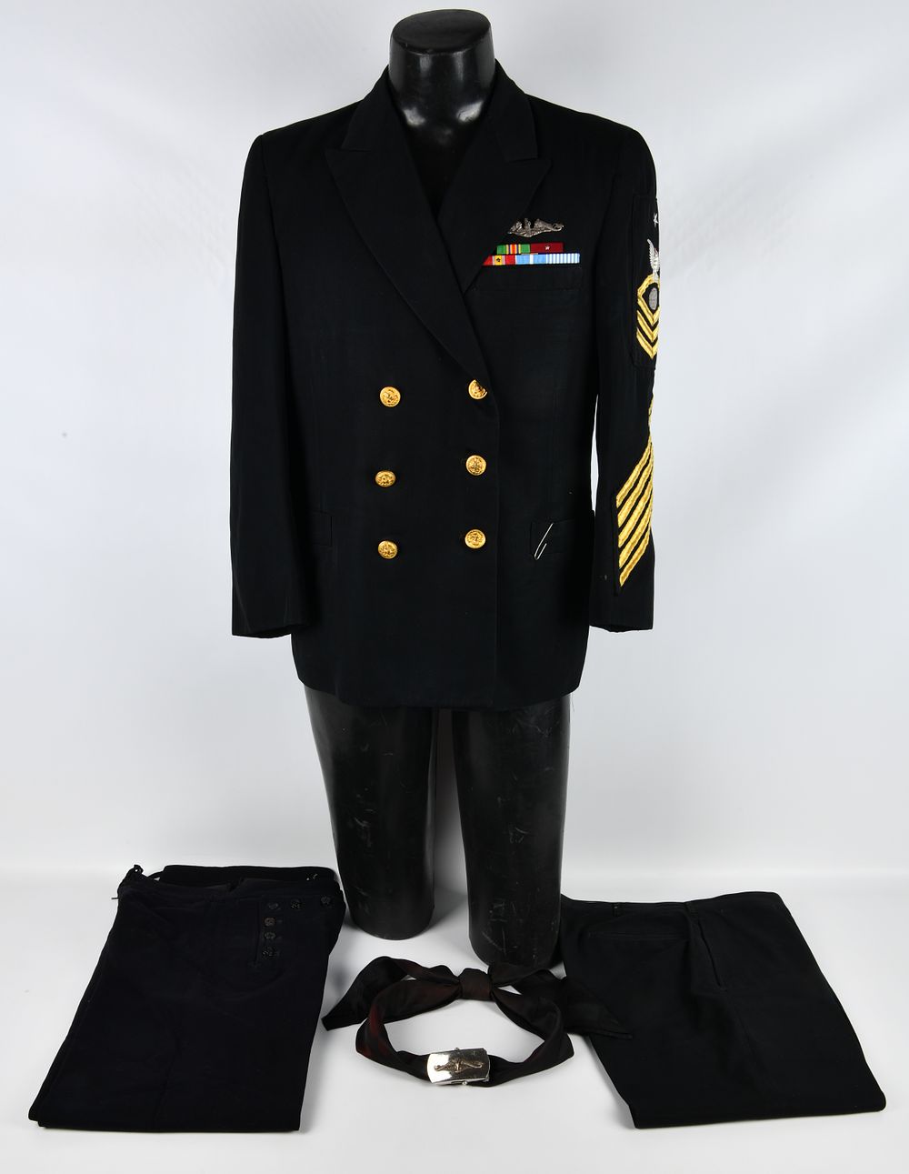 Lot 317: A Vietnam Era U.S. Navy Chief Petty Officer's Dress Blue Uniform Ensemble by Novakooff Bros.