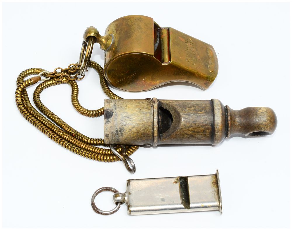 Lot 172: Three Vintage Whistles, including a U.S. Military Brass Pea Whistle