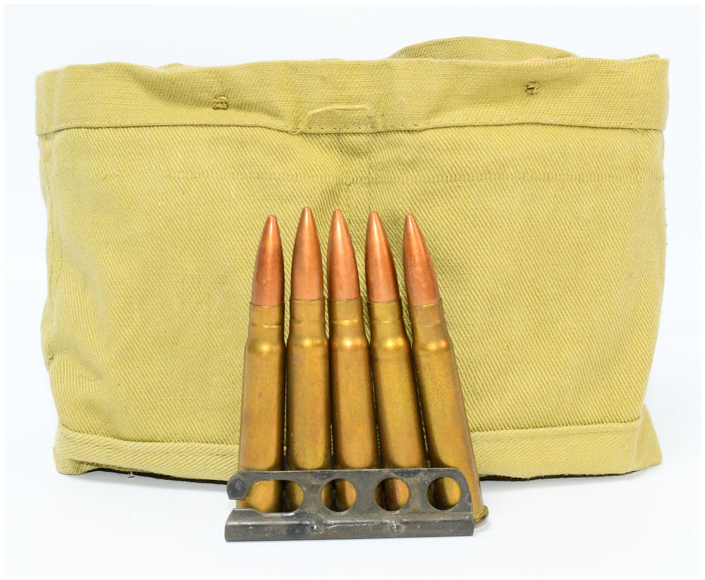 Lot 241: 44 ROUNDS OF .303 BRITISH AMMUNITION WITH STRIPPER CLIPS & BANDOLIER