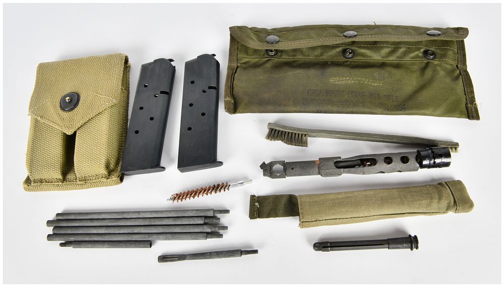Lot 385: A Collection of US Military M16 Rifle Cleaning Kit Components, WWII-Era Pouch, and Firearm Accessories