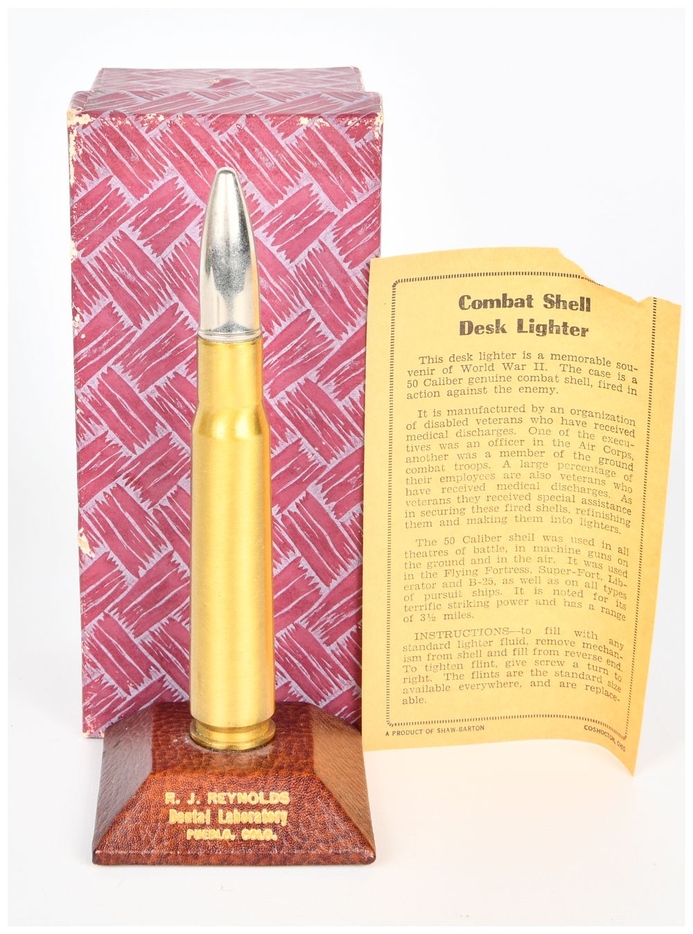 Lot 475: WWII Trench Art .50 Caliber Combat Shell Desk Lighter by Shaw-Barton
