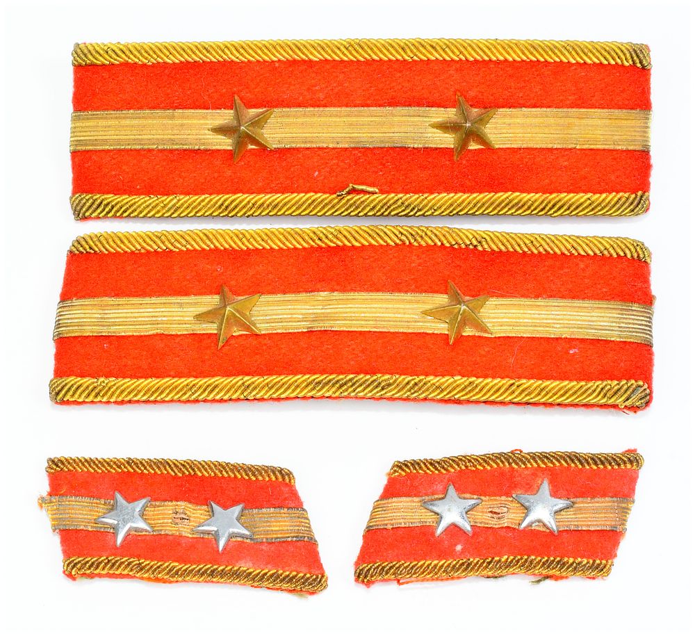 Lot 1159: A Group of Four Japanese WWII Imperial Army Shoulder Insignia