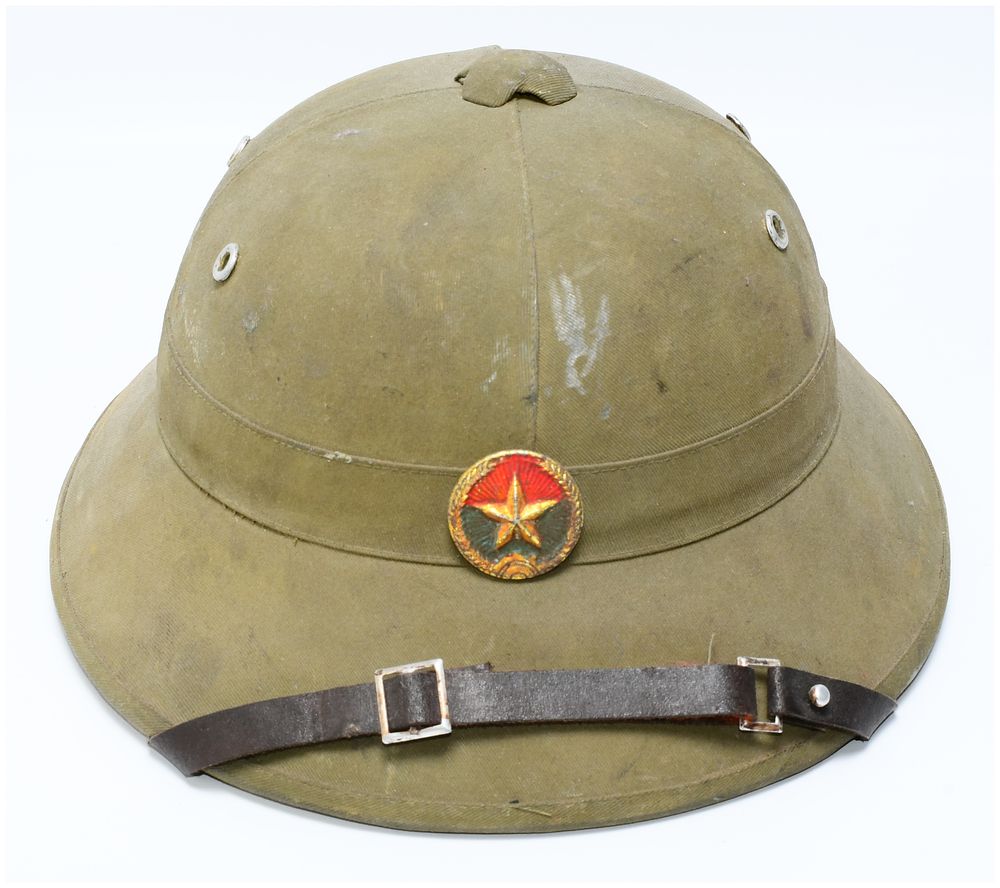 Lot 1513: Original Vietnam War North Vietnamese Army (NVA) Pith Helmet with Insignia and Interior Label