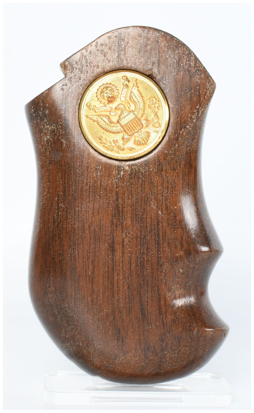 Lot 137: A Single Sculpted Dark Brown Hardwood Firearm Grip with Great Seal of the United States Medallion