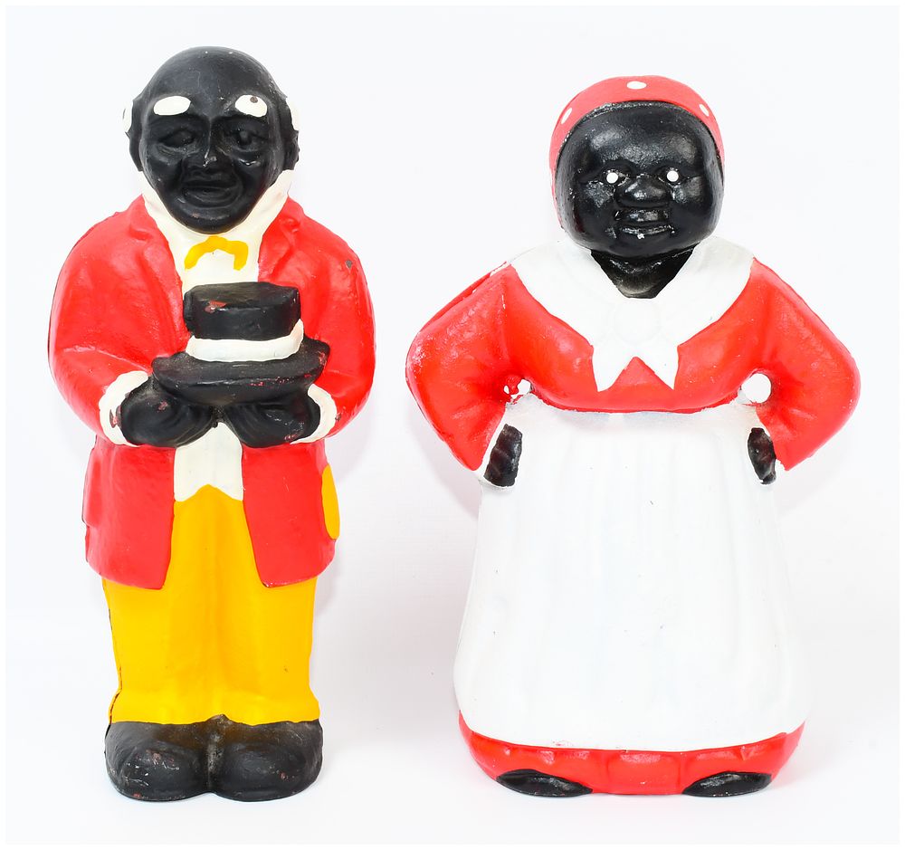Lot 248: A Pair of Cast Iron 'Aunt Jemima' and Companion Figural Coin Banks