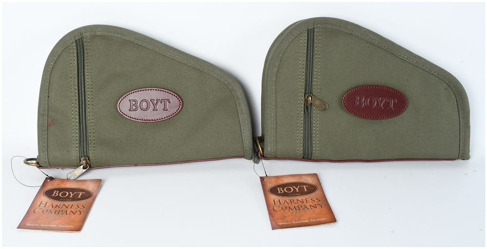 Lot 428: A Pair of Boyt Harness Company Heart-Shaped OD Green Pistol Rugs