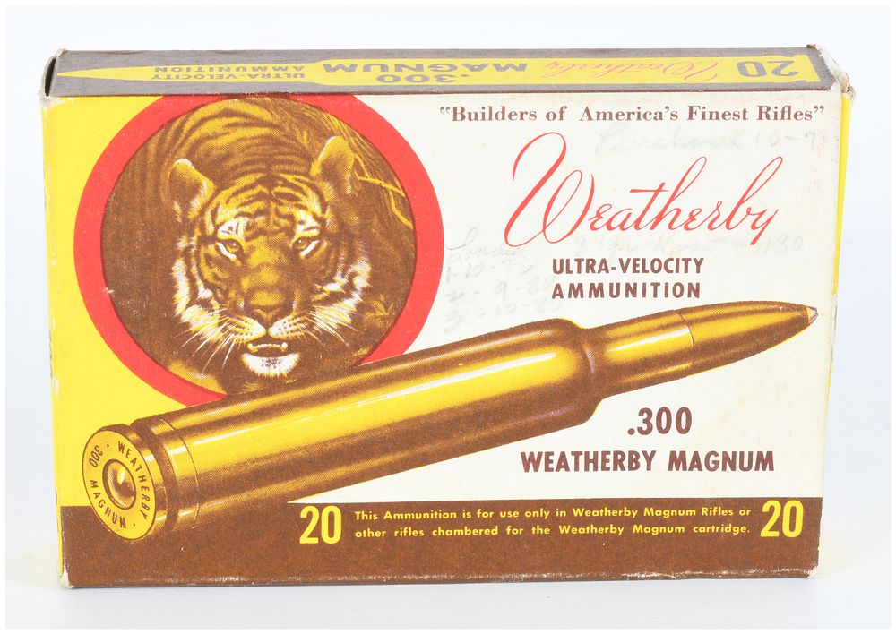 Lot 536: Vintage Weatherby .300 Weatherby Magnum Ammunition Box with Tiger Motif, Containing 7 Live Rounds and 13 Empty Brass