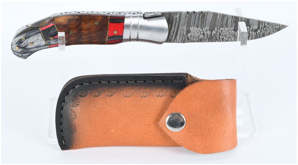 Lot 1079: Laguiole Style Folding Knife with Damascus Steel Blade and Wood Handle