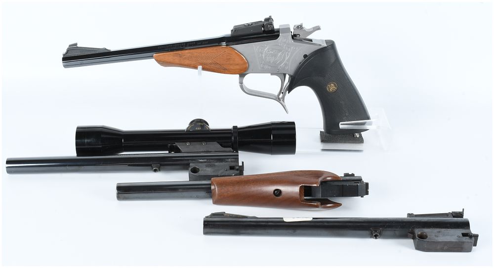 Lot 1143: Thompson/Center Contender Modular Pistol System with 4 Barrel Set: .357 Magnum Installed, .22 Hornet Heavy Barrel, .30 Herrett, and .22 Magnum With a Scope