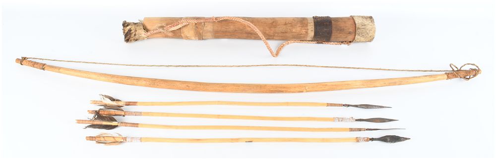 Lot 1226: A Traditional Ethnographic Bow, Quiver, and Set of Four Arrows