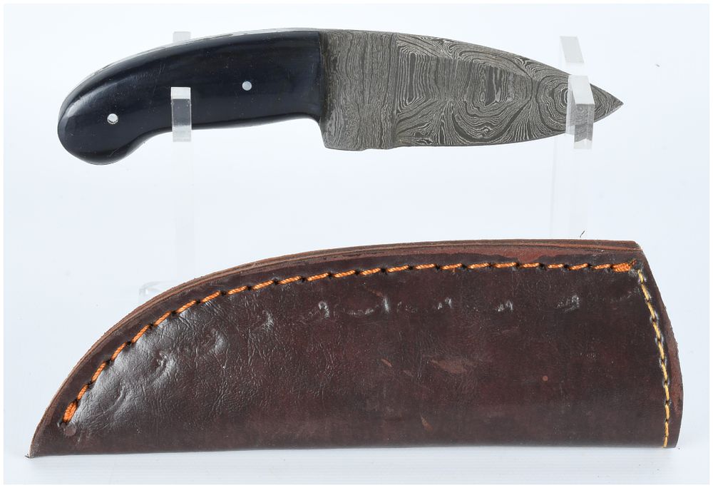 Lot 1229: A Fixed-Blade Damascus Steel Knife with Leather Sheath