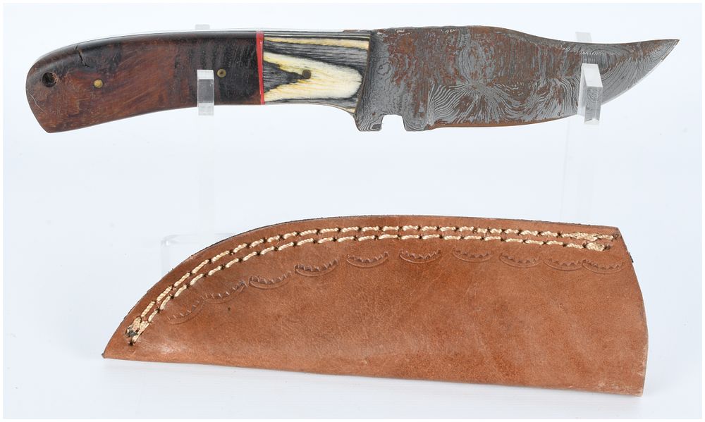 Lot 1259: A Custom Damascus Steel Fixed-Blade Hunting Knife with Wood and Bone Handle and Leather Sheath