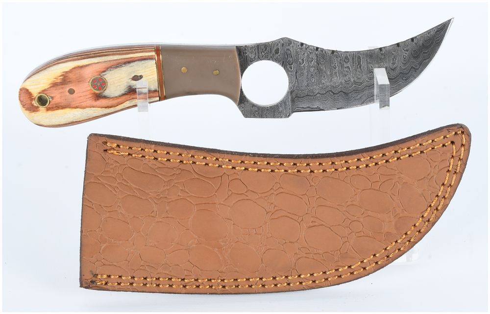 Lot 1319: A Contemporary Fixed-Blade Damascus Knife with Laminated Wood and Composite Handle and Leather Sheath