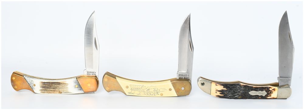 Lot 1406: Three Schrade Scrimshaw and Uncle Henry Lockback Folding Knives