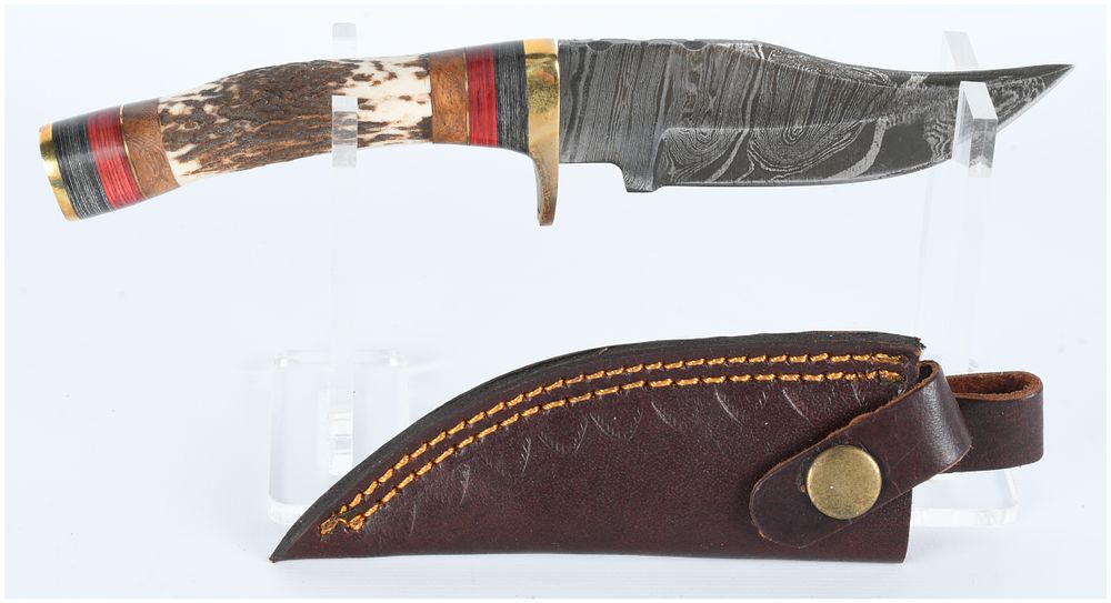 Lot 1529: A Contemporary Damascus Steel Fixed-Blade Hunting Knife with Composite Antler Handle and Leather Sheath
