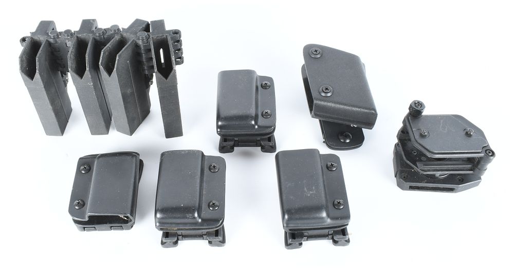Lot 257: A Collection of 7 Safariland and Custom Polymer Magazine Pouches and Competition Gear Components