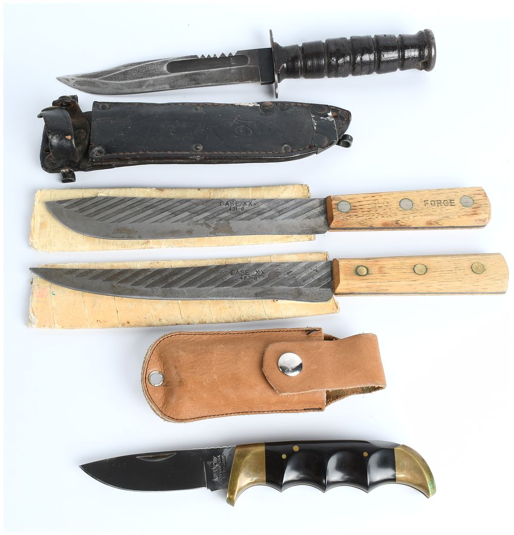 Lot 284: A Collection of Four Vintage Fighting and Utility Knives by Camillus, Case XX, and Kershaw