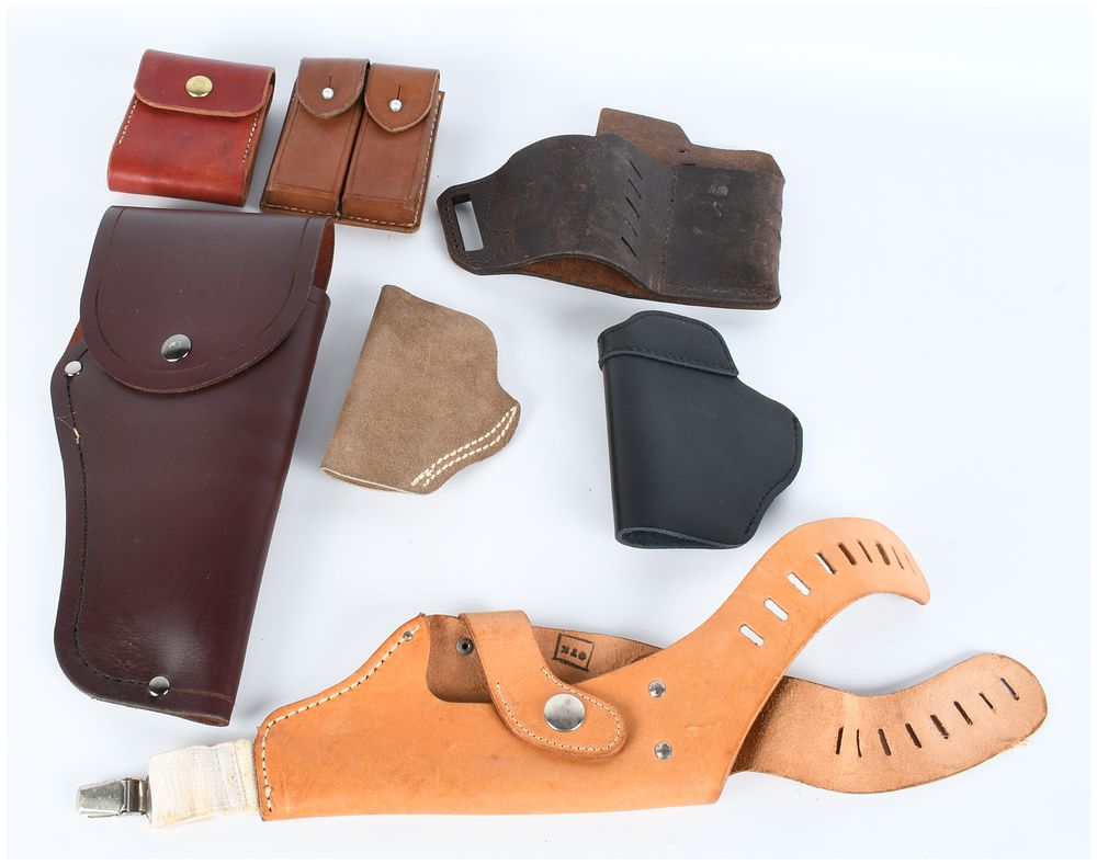 Lot 287: A Collection of 7 Leather and Polymer Firearm Accessories Holsters and Magazine Pouches