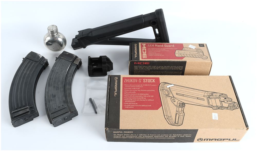 Lot 374: A Collection of 8 Magpul Zhukov and MOE AK-47/AK-74 Accessories with Two Steel Magazines