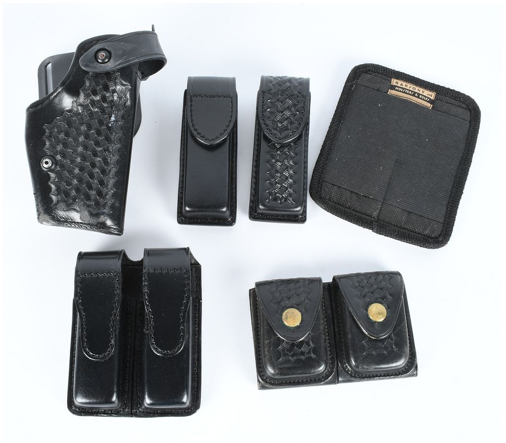Lot 467: Safariland Model 6280 Duty Holster and Collection of 5 Leather Duty Accessories