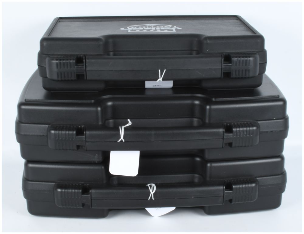 Lot 557: A Trio of Polymer Hard Storage Cases, Including One Valken Tactical Case