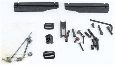 A Collection of 22 Firearm and Tactical Accessories Including Picatinny Rails and Sight Components. 