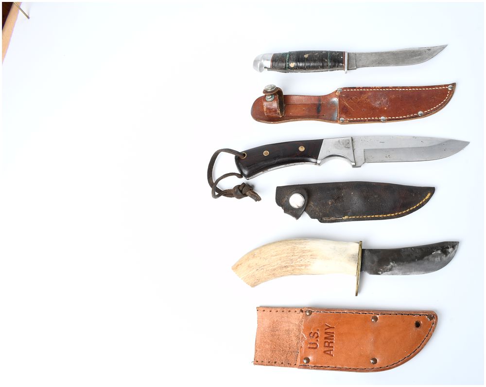 Lot 1097: Collection of Three Fixed-Blade Knives and Associated Sheaths, including KA-BAR Style Military Issue