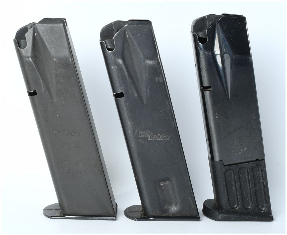 Lot 1163: Three Sig Sauer P226 9mm Pistol Magazines