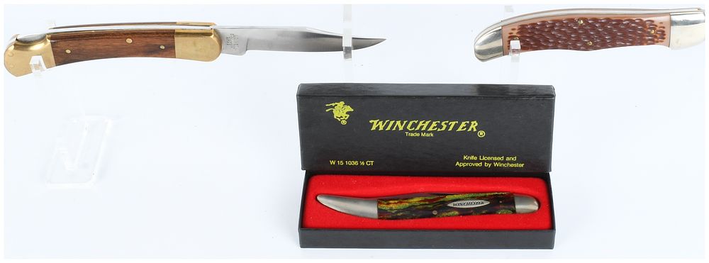 Lot 1394: A Trio of Winchester Folding Pocket Knives including 1992 Christmas Tree Toothpick and First Production Run